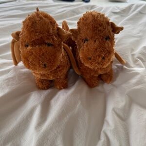 Two Plush Dragons